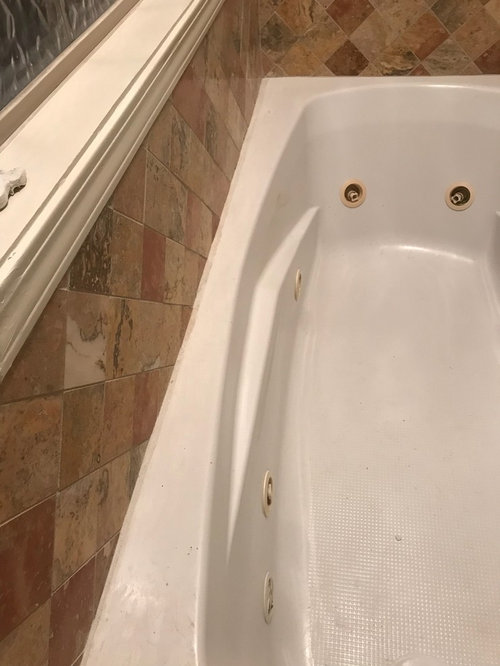 Need help with gap between bathtub and tile wall