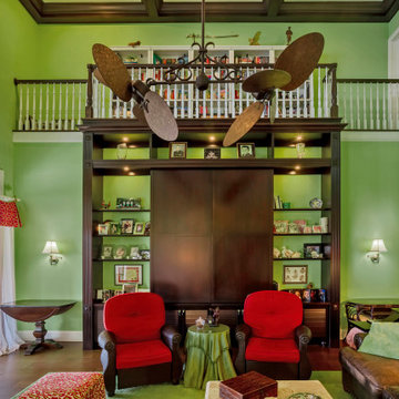 Grand Living Room With Custom Library and Striking Architectural Details