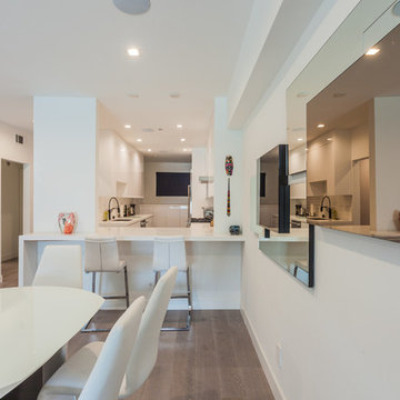 Kitchen Pass-Through Opens to Round Dining Table