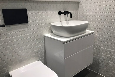 white hexagon mosaic bathroom