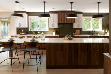 Mid-sized mid-century modern l-shaped light wood floor and beige floor eat-in kitchen photo in Minneapolis with a single-bowl sink, flat-panel cabinets, dark wood cabinets, quartz countertops, green backsplash, glass tile backsplash, stainless steel appliances, an island and white countertops