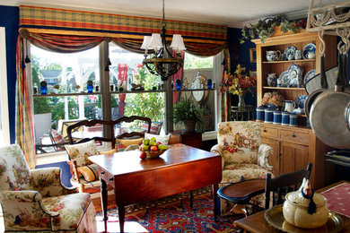 Inspiration for a timeless medium tone wood floor enclosed kitchen remodel in Other with solid surface countertops
