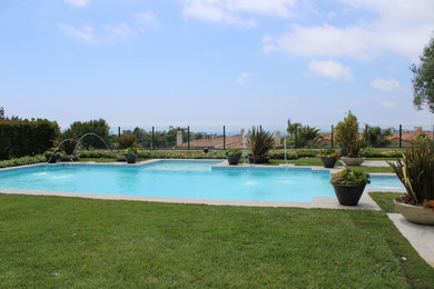 Inspiration for a modern pool remodel in Orange County