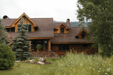Example of a mountain style house exterior design in Albuquerque