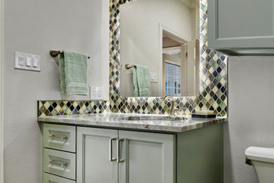 Powder room - transitional powder room idea in Dallas