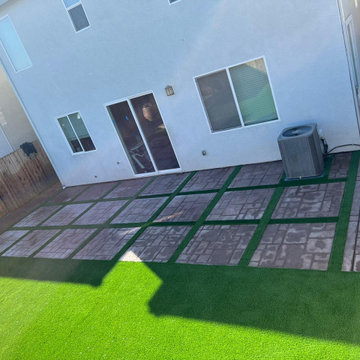 Hollister Stamped Concrete Backyard with Synthetic Grass