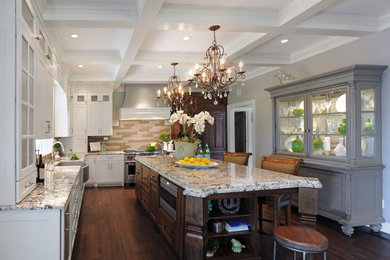 Elegant kitchen photo in Columbus with a single-bowl sink, shaker cabinets, white cabinets, multicolored backsplash and stainless steel appliances