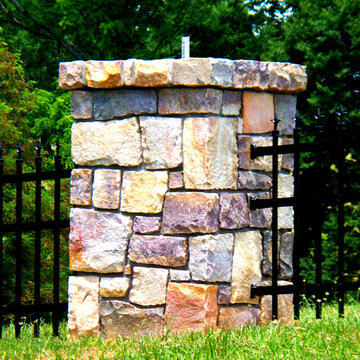 Stone columns and gate posts constructed by Quality Concrete & Masonry