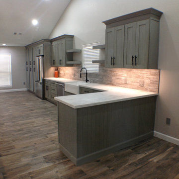 West Main Project - Heather Grey Shaker Cabinets, Marsala 8125 Quartz