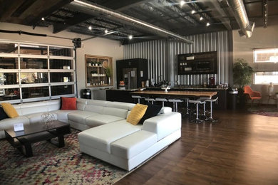 Living room - industrial living room idea in Houston