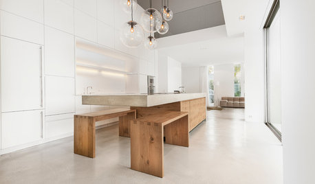 Beton und Holz: Zwei starke Zutaten für eine Küche am Bodensee