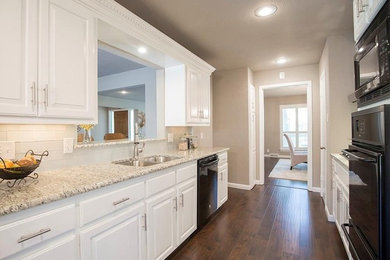 Example of a transitional kitchen design in Dallas