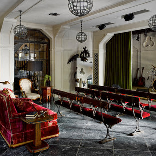 Large elegant enclosed gray floor home theater photo in San Francisco with white walls