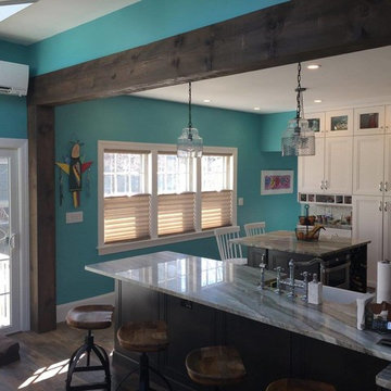 Omega Loring Full Access Transom Cabinetry with Fantasy Brown Quartzite Counters