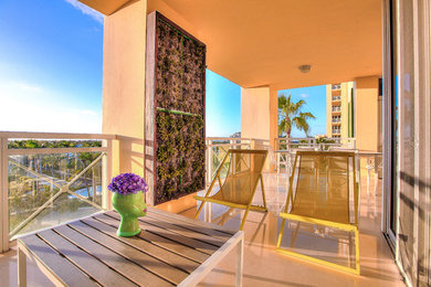 Photo of a transitional balcony in Miami.