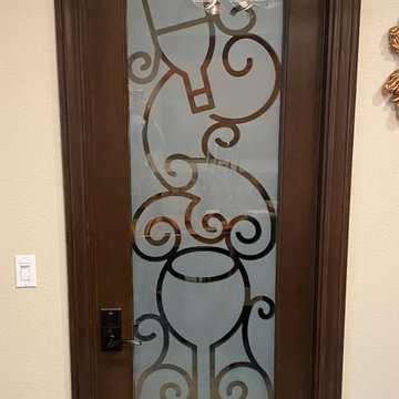 Reverse etched glass door