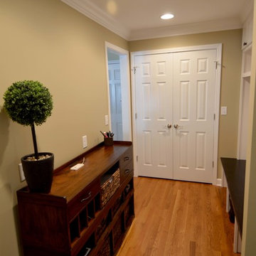 One useless space turns into two highly functional spaces; Mudroom & Office