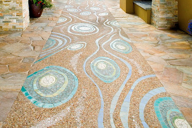 Photo of a beach style patio in San Diego with tile.