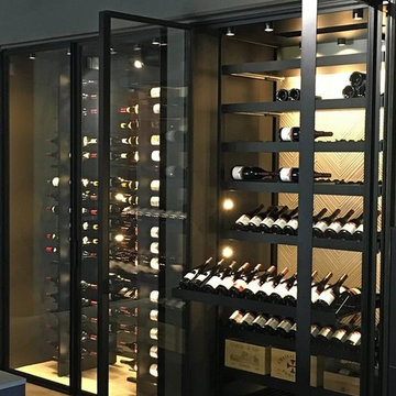 Modern Wine Wall with Sliding Trays and Metal Racking