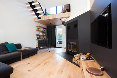 Living room - modern living room idea in Montreal