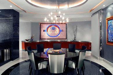 Example of a mid-sized minimalist marble floor and gray floor great room design in Tampa with blue walls and no fireplace