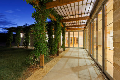 This is an example of a transitional patio in Dallas.