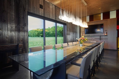 Inspiration for a huge concrete floor wine cellar remodel in Toronto
