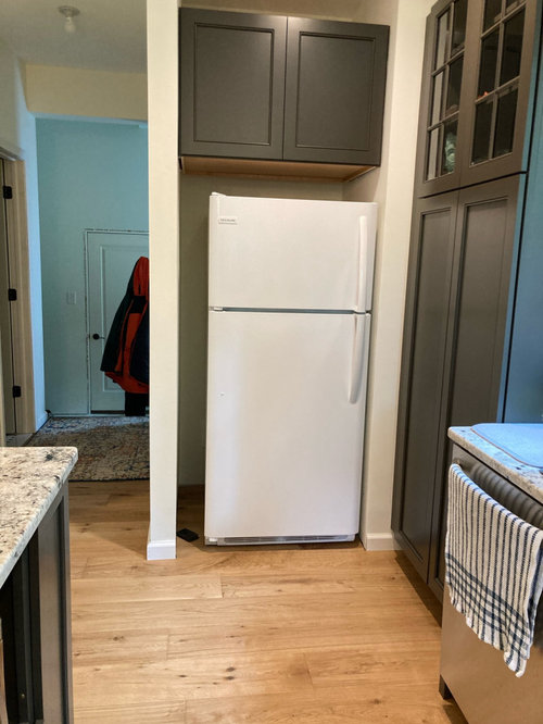 Refrigerator door swing