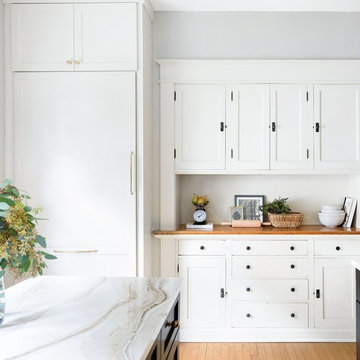 Chic, character-preserving kitchen remodel with Brittanicca Gold