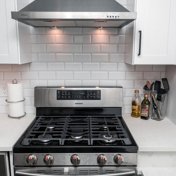 Gas Range with White Subway Tile Backsplash