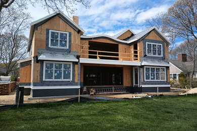 Inspiration for a transitional two-story house exterior remodel in Boston