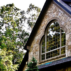 Colonial Tan Mosaic House - Siding And Stone Veneer