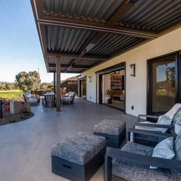 Covered Modern Patio with Outdoor Lounge Seating and Golf Course Views