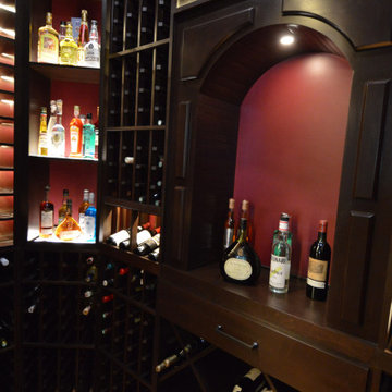 A Wooden Wine Rack With Arches Softens the Look