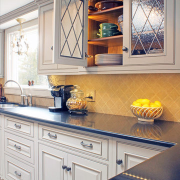 Custom Cream French Country Kitchen with Blue Hutch