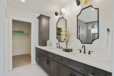 Design ideas for a mid-sized country master bathroom in Sacramento with shaker cabinets, dark wood cabinets, an alcove shower, gray tile, ceramic tile, engineered quartz benchtops, white benchtops, a double vanity and a built-in vanity.