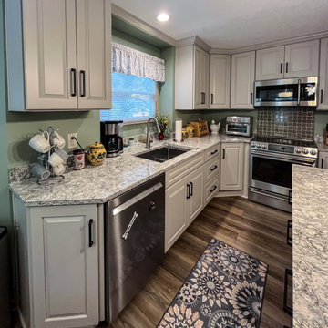 Two Tone Kitchen with Irish Creme Cabinets and Rustic Dockside Island