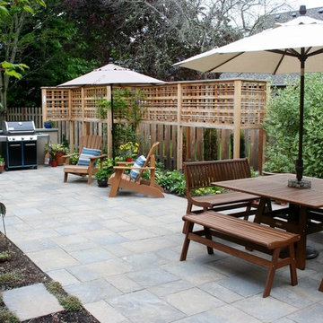 Project #2 AFTER: New ground level patio with staggered privacy screen