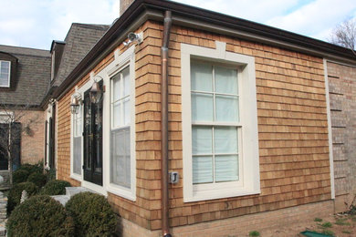 Example of a transitional home design design in Other