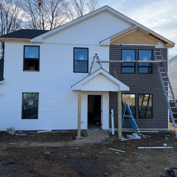 Wood composite and vinyl siding exterior