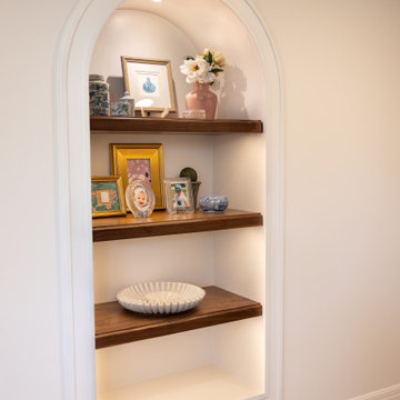 Traditional Basement Remodel with Custom Bar & Entertainment Spaces