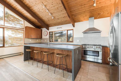 Inspiration for a mid-sized modern u-shaped beige floor open concept kitchen remodel in Other with an undermount sink, flat-panel cabinets, medium tone wood cabinets, gray backsplash, stainless steel appliances, an island and gray countertops
