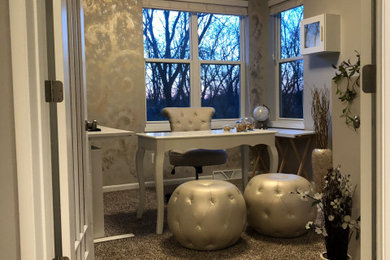 Example of a transitional home office design in Other
