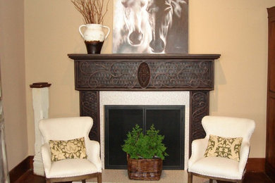 Design ideas for a living room in Atlanta with a metal fireplace surround.