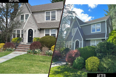 Gray two-story concrete fiberboard and clapboard exterior home photo in New York with a shingle roof and a gray roof