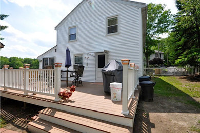 Large elegant backyard deck photo in Boston