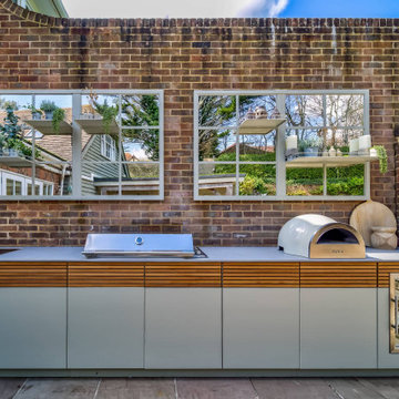 A contemporary outdoor kitchen masterpiece