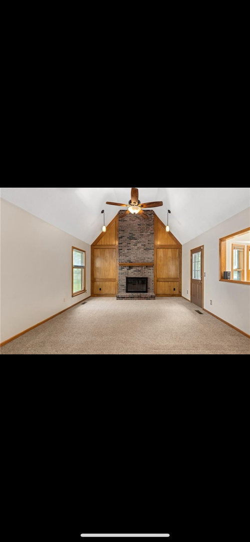 How much oak trim should I paint white in our 80s built home?