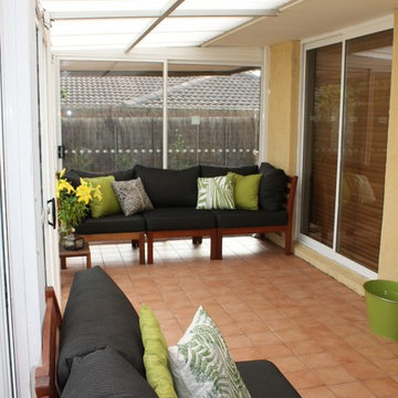 From Depressing to Cheerful: Our $2000 Sunroom Makeover