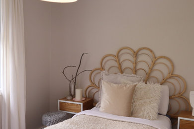 This is an example of a beach style bedroom in Canberra - Queanbeyan.